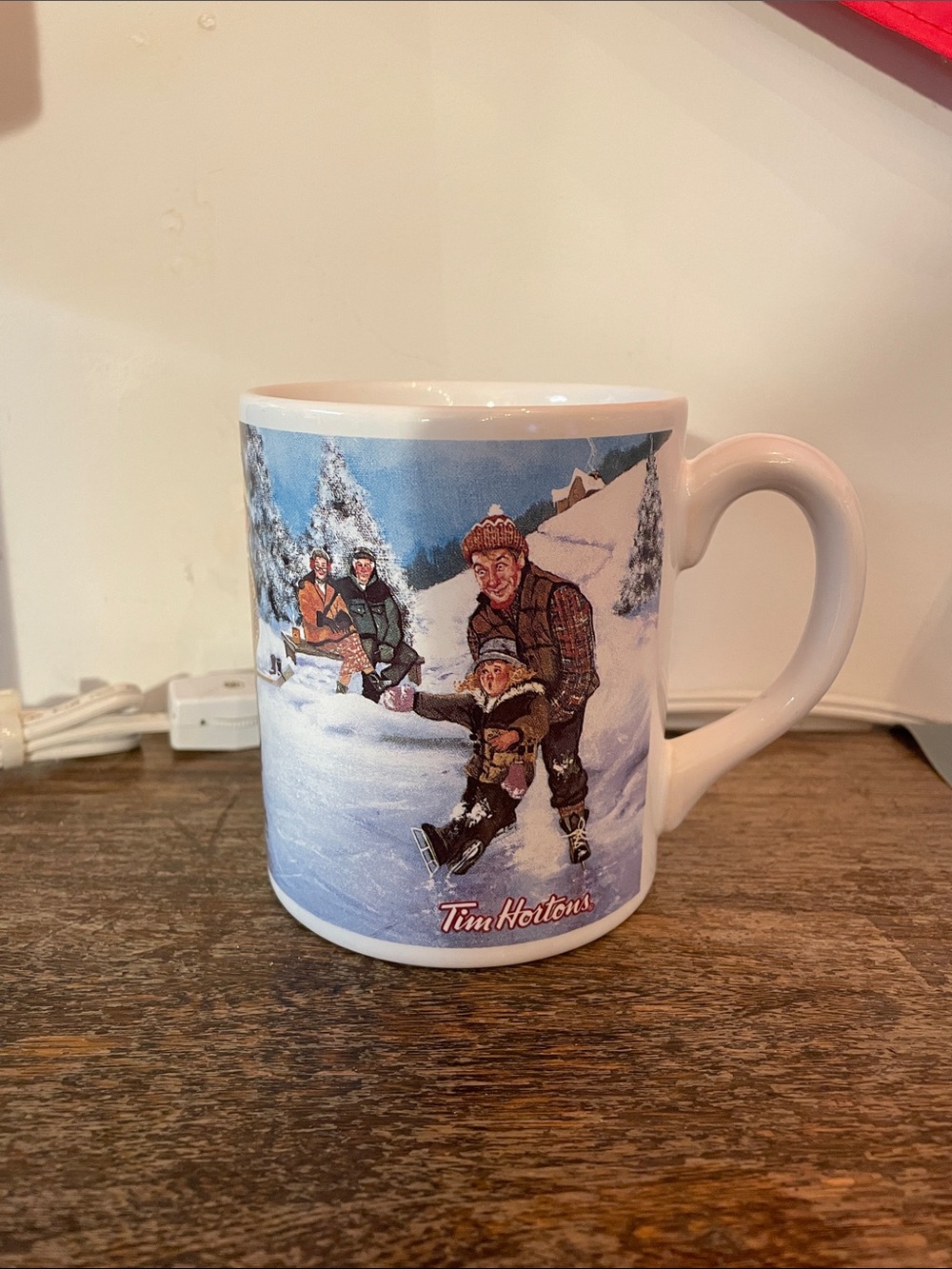 Tim Hortons Skating Pond Ceramic Coffee Mug - Blue and White skating scene